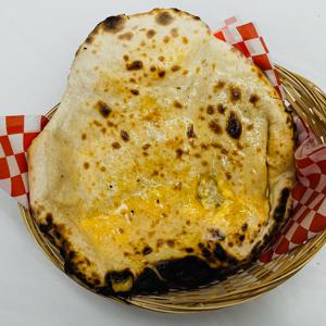 Clay Oven Breads (Cheese Naan Shown)